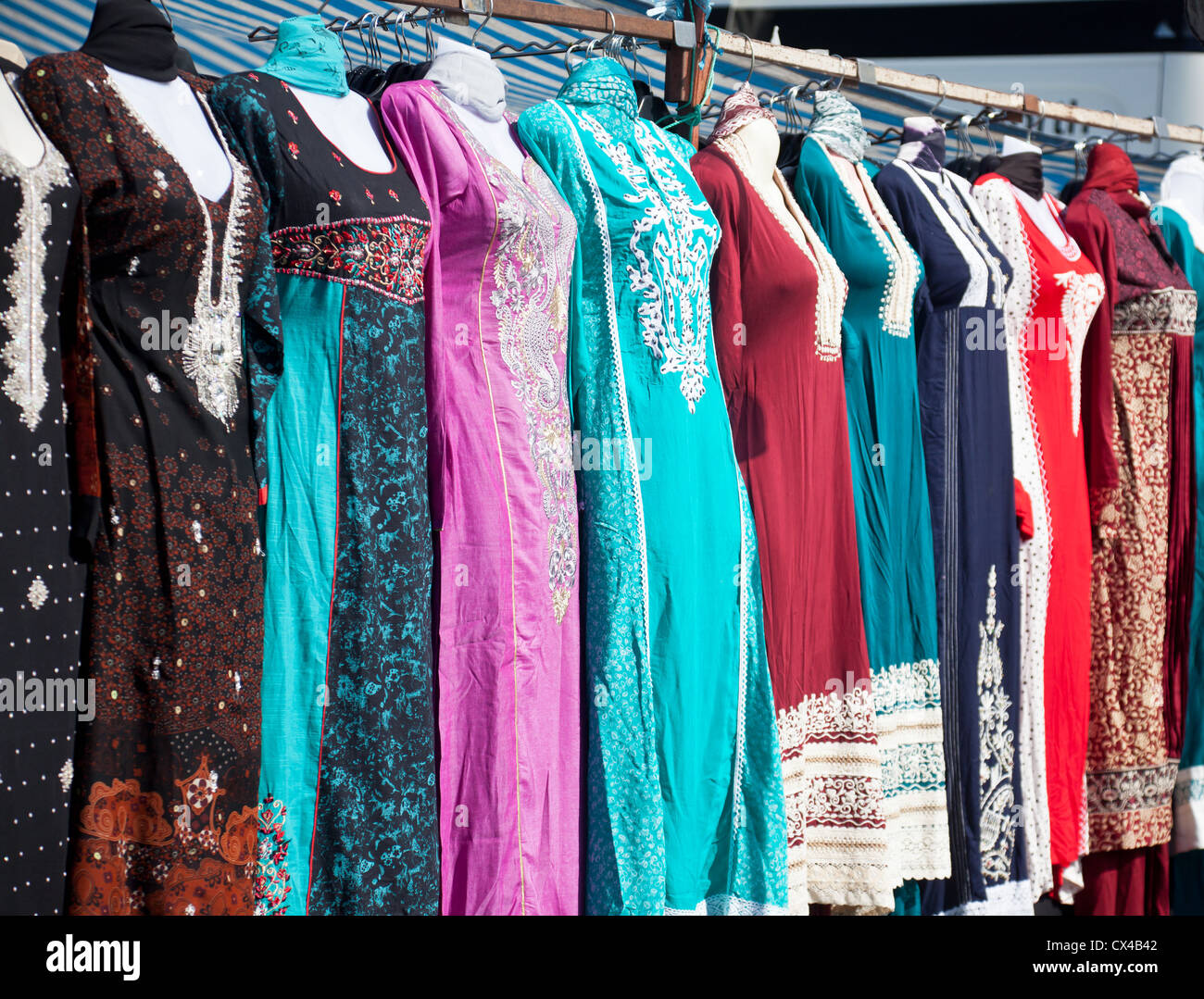Modern Punjabi suits Shalwar kameez for sale on racks at Edinburgh Mela Stock Photo Alamy