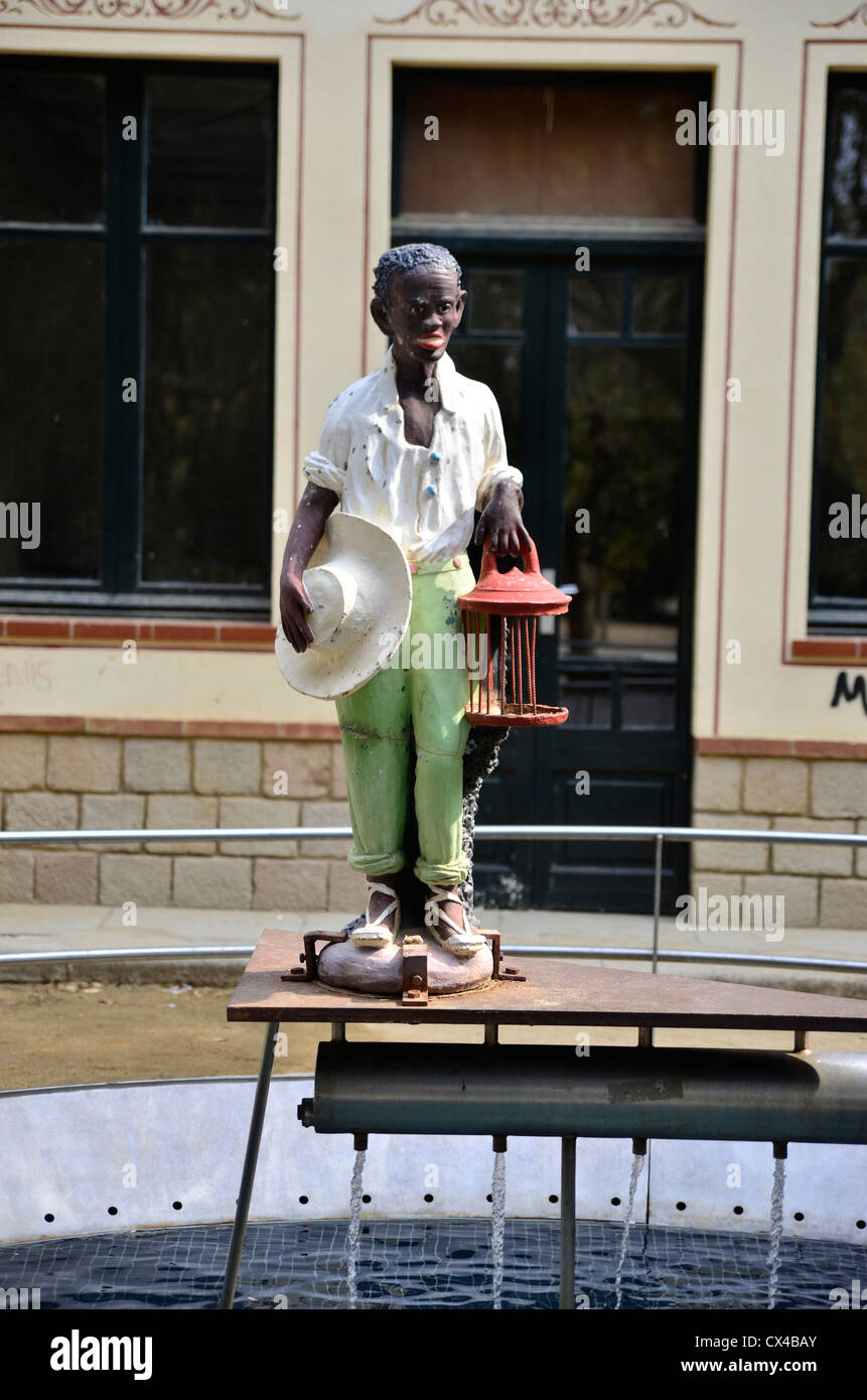 Black men statue in Mataró, fountain Stock Photo Alamy