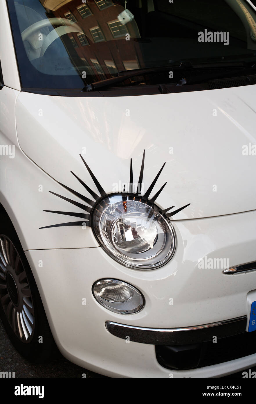 Cute Eye-lashes accessories on Fiat Cinquecento, Melcombe Street, London, England, UK Stock Photo