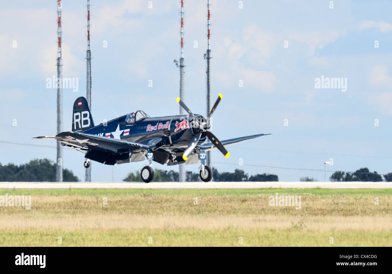 Chance Vought F4U Corsair fighter aircraft in flight during landing at Berlin air show (ILA). Tele photo shot. Stock Photo