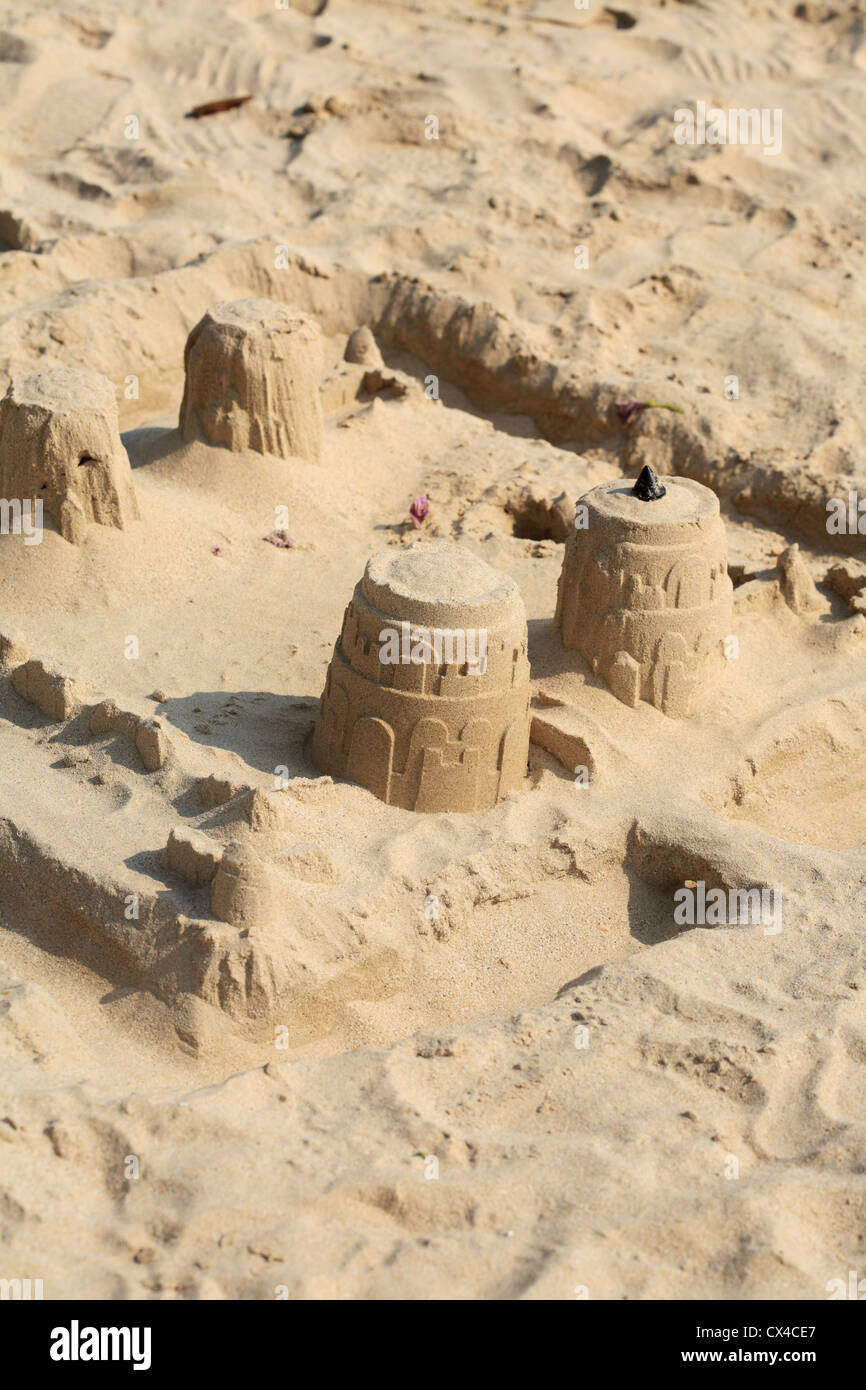 sand castle building by child Stock Photo