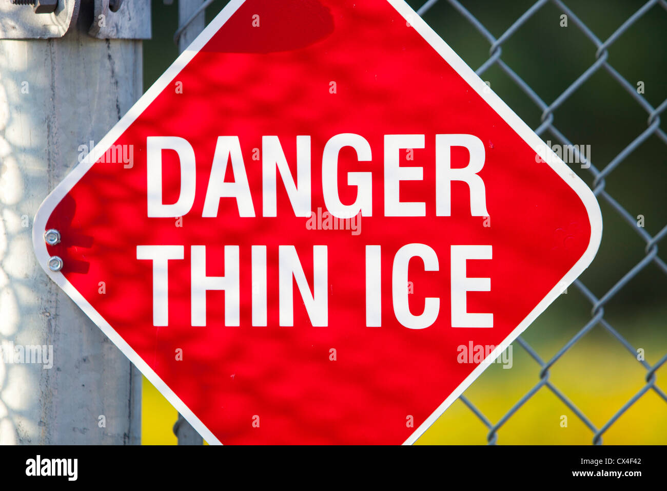 A warning sign about thin ice in Fort McMurray, Alberta, Canada. Stock Photo