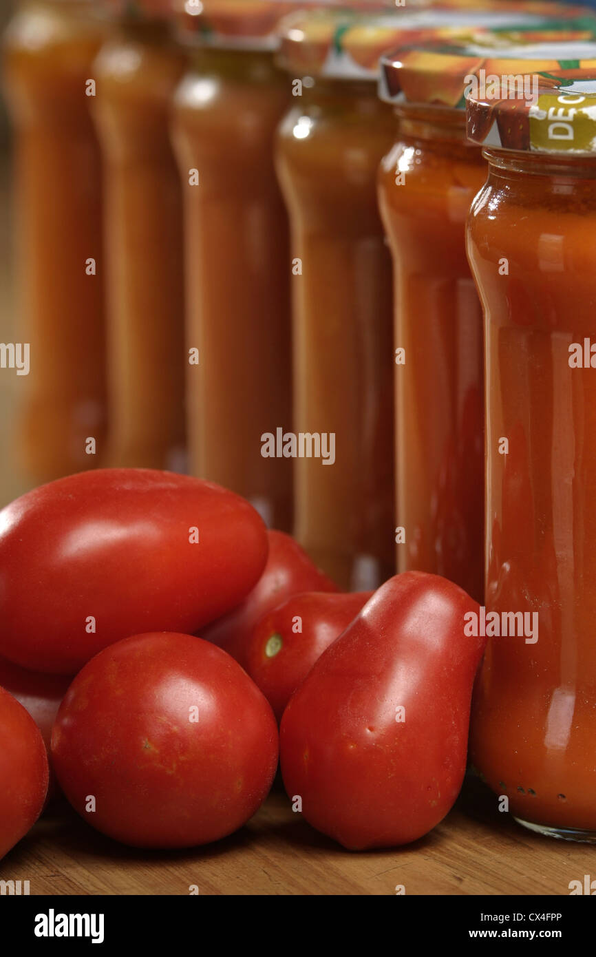 Picture: Steve Race - Home preserved tomatoes from the plum variety Roma VF. Stock Photo