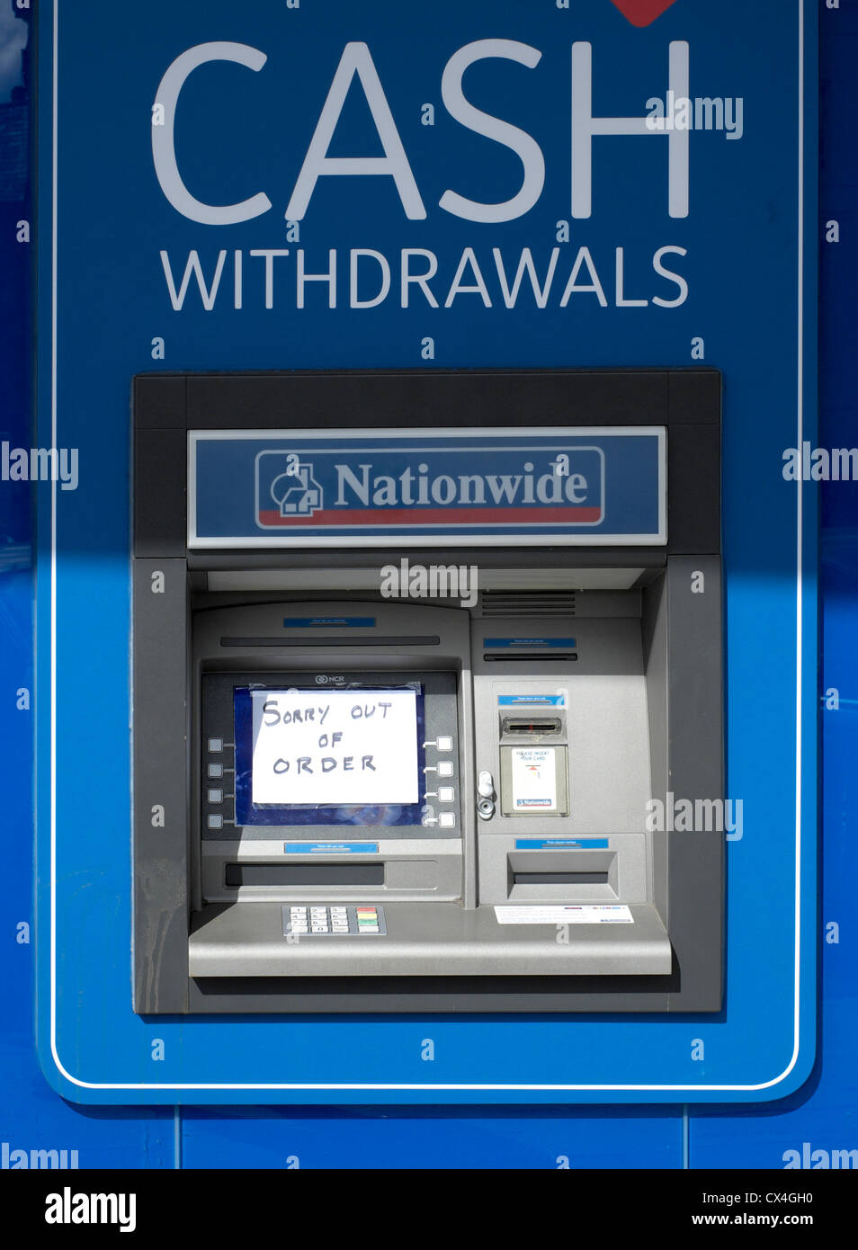 ATM cash machine with out of order sign stuck over screen Stock Photo