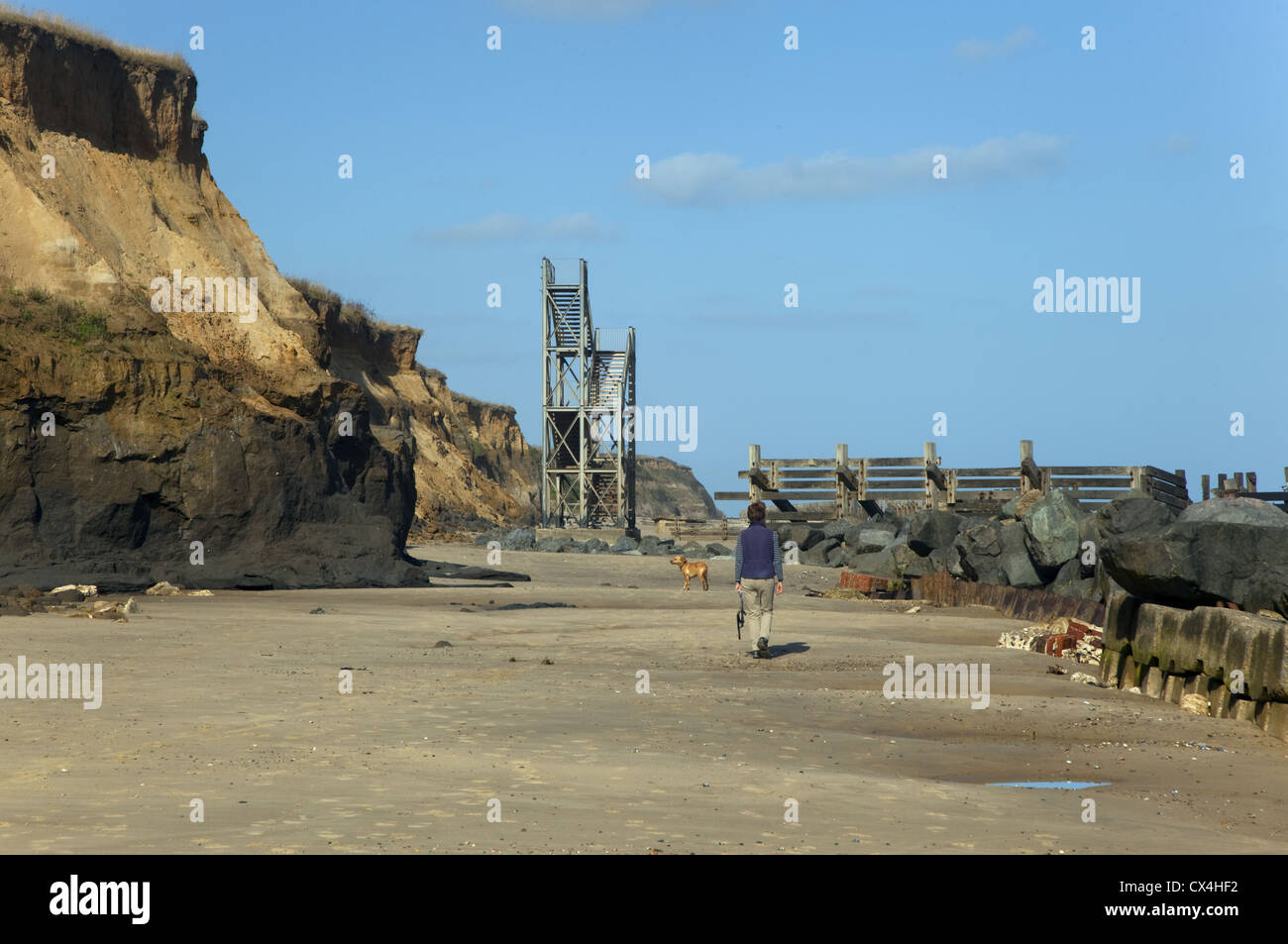 Cliff stairway now isolated after Coastal erosion Happisburgh Norfolk UK September 2012 Stock Photo