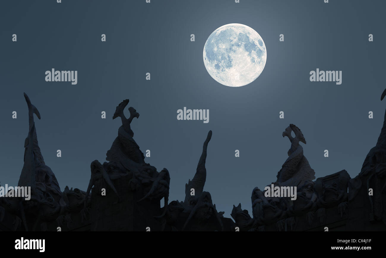 Stone monsters under the moon Stock Photo
