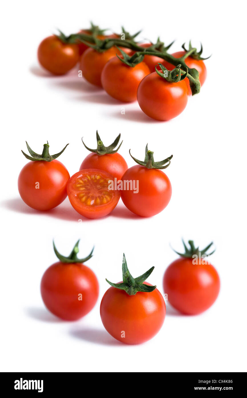 cherry tomatoes isolated on a white background Stock Photo - Alamy