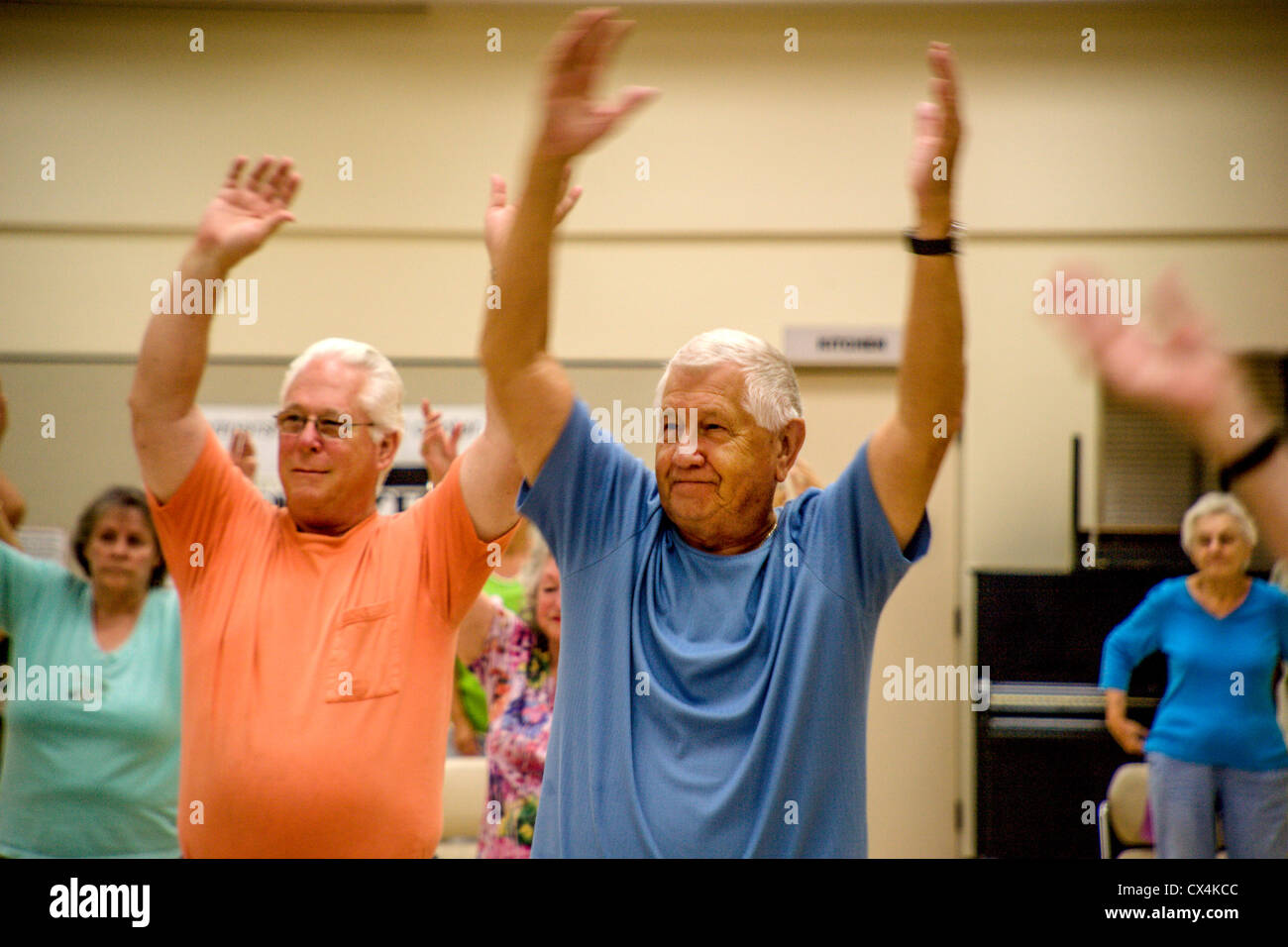 Senior women and men work out during an exercise class at a senior center in Tustin, CA. Stock Photo