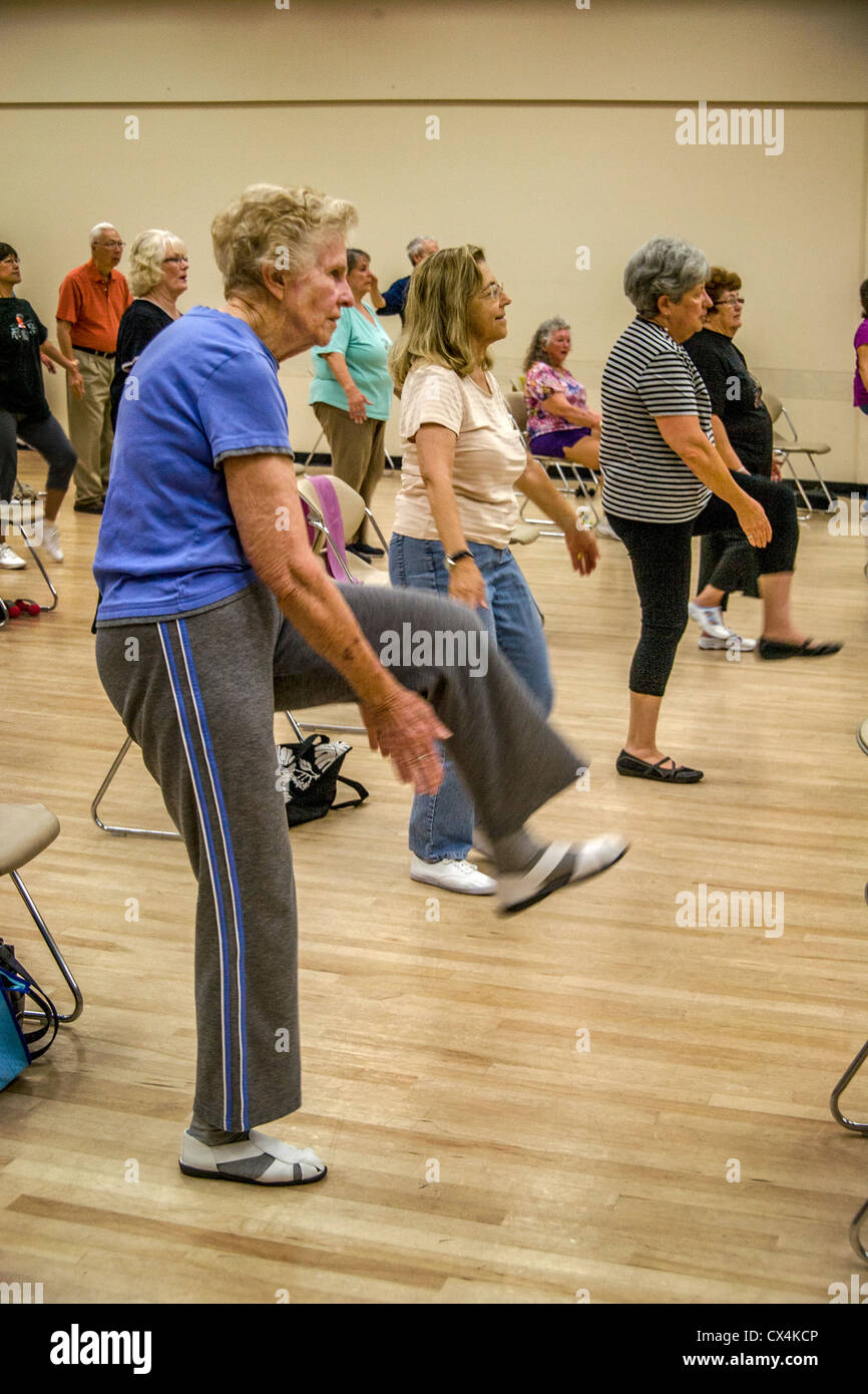 Senior women work out during an exercise class at a senior center in Tustin, CA. Stock Photo