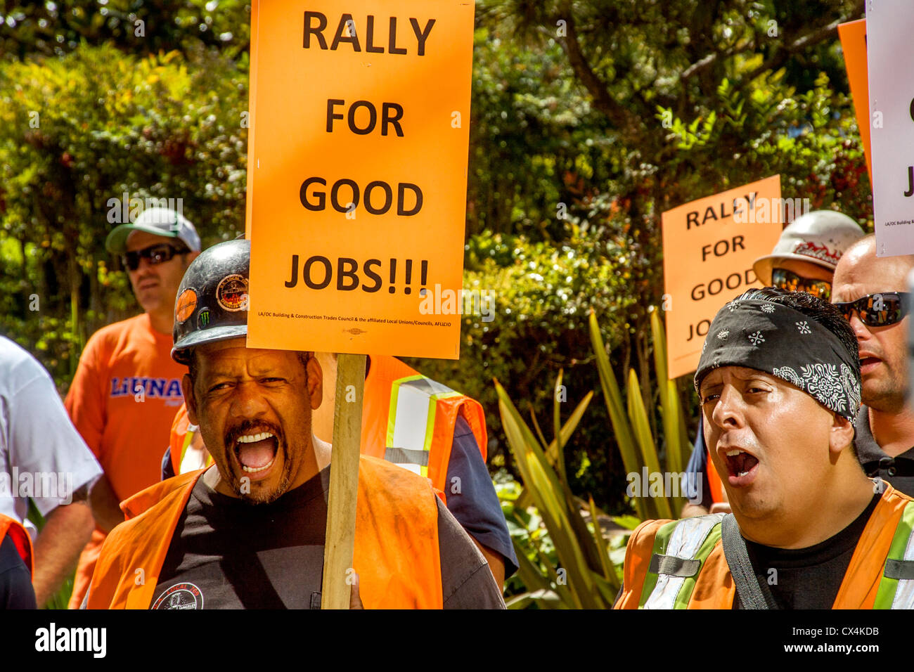 At Anaheim, CA, city hall, workers protest a city council ballot measure restricting local workers' hiring. Stock Photo