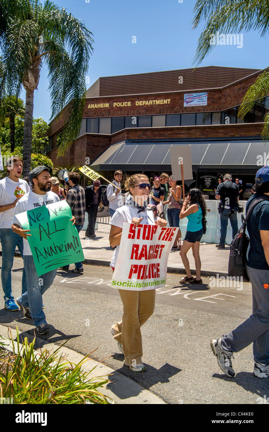 Angry but nonviolent  pickets march at Anaheim, CA, police headquarters to protest recent police shootings of local Hispanics. Stock Photo
