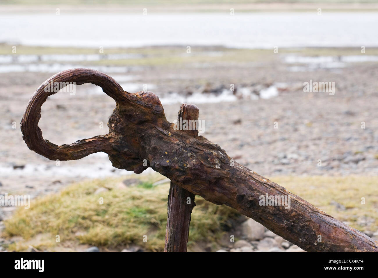 Old rusting anchor shank on a British beach Stock Photo Alamy