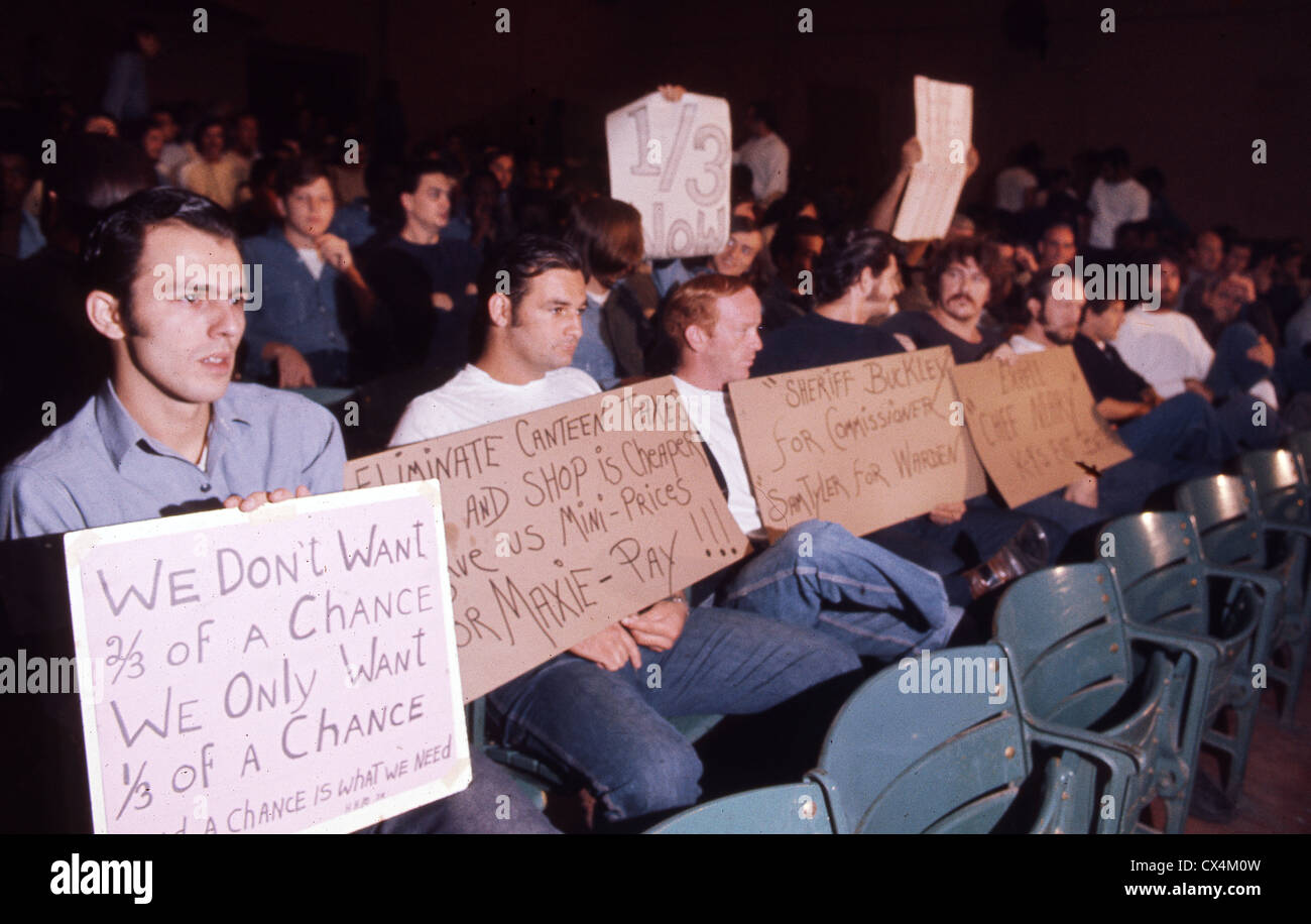 Convicts at Walpole State Prison in Massachusetts demonstrate in 1971 with signs demanding a change in parole policy. Stock Photo