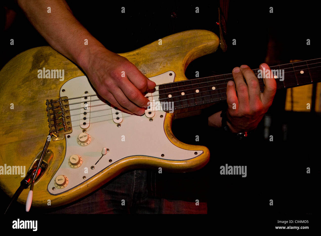 Closeup of a Fender Stratocaster being played by Lee Wharton during the 2012 Dundee Blues Bonanza,UK Stock Photo