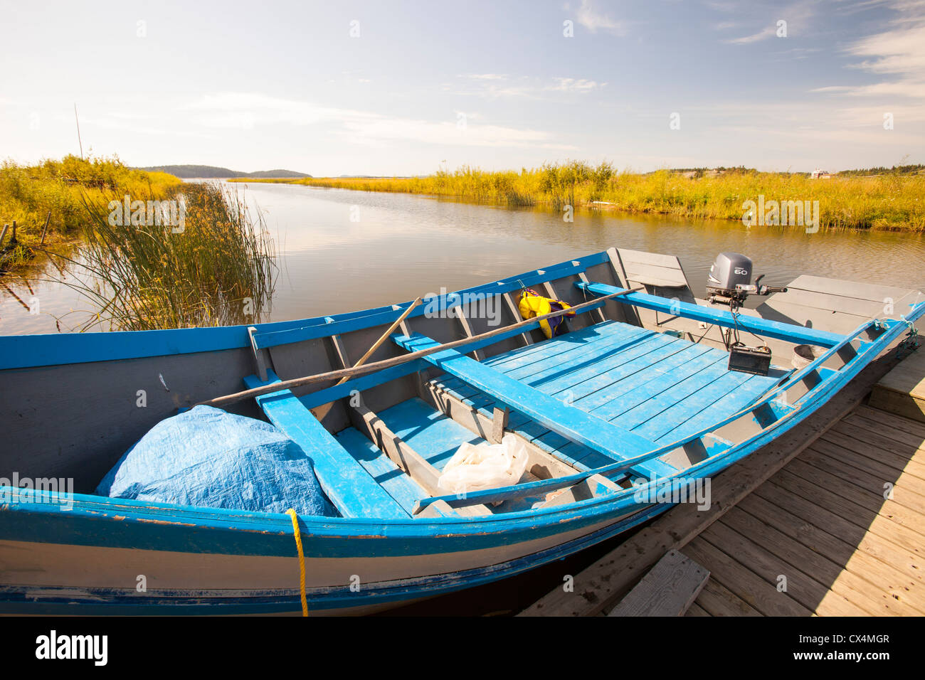 A fishing boat on Lake Athabasca in Fort Chipewyan, a First Nation community downstream of the tar sands industry. Stock Photo