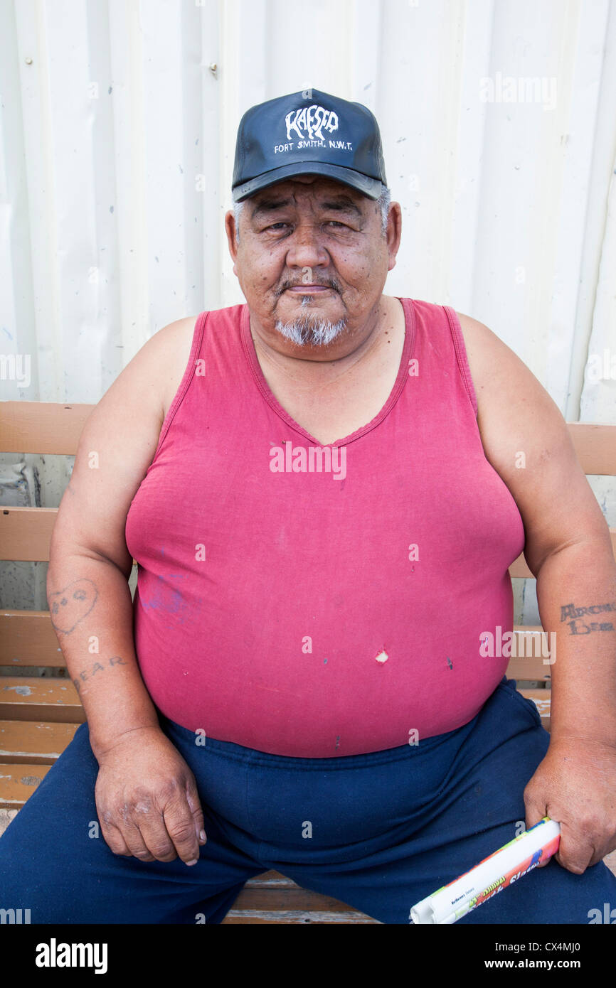 An obese first nation man in Fort Chipewyan downstream of the tar sands. Stock Photo