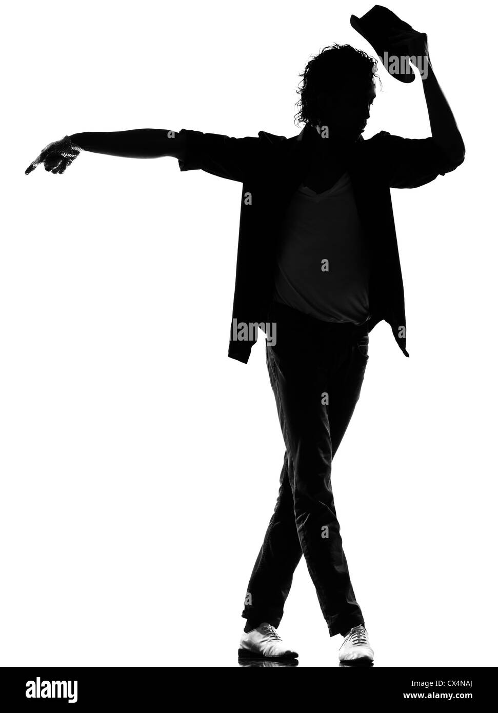full length silhouette of a young man dancer dancing funky hip hop r&b on  isolated  studio white background Stock Photo