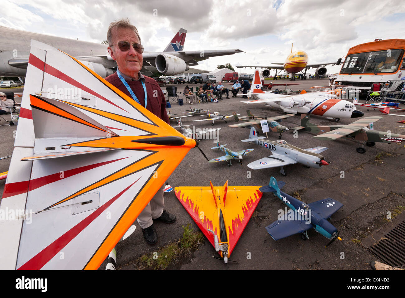 Colin Matthews with his model of a Rapier aircraft in hand at the Best of British Show, Cotswold (Kemble EGBP) Airport. JMH6082 Stock Photo