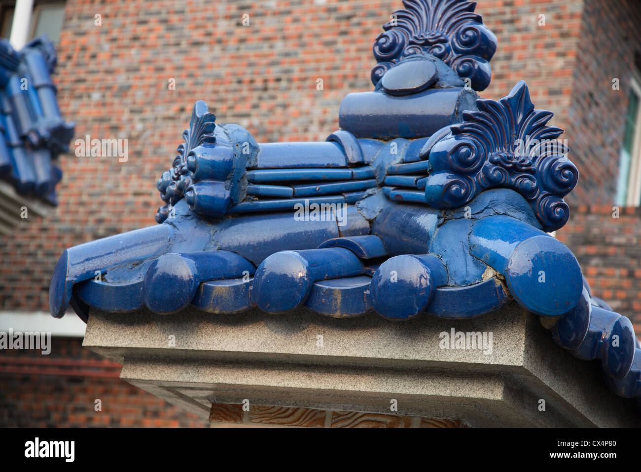 Blue Asian style clay roof embellishment in South Korea Stock Photo