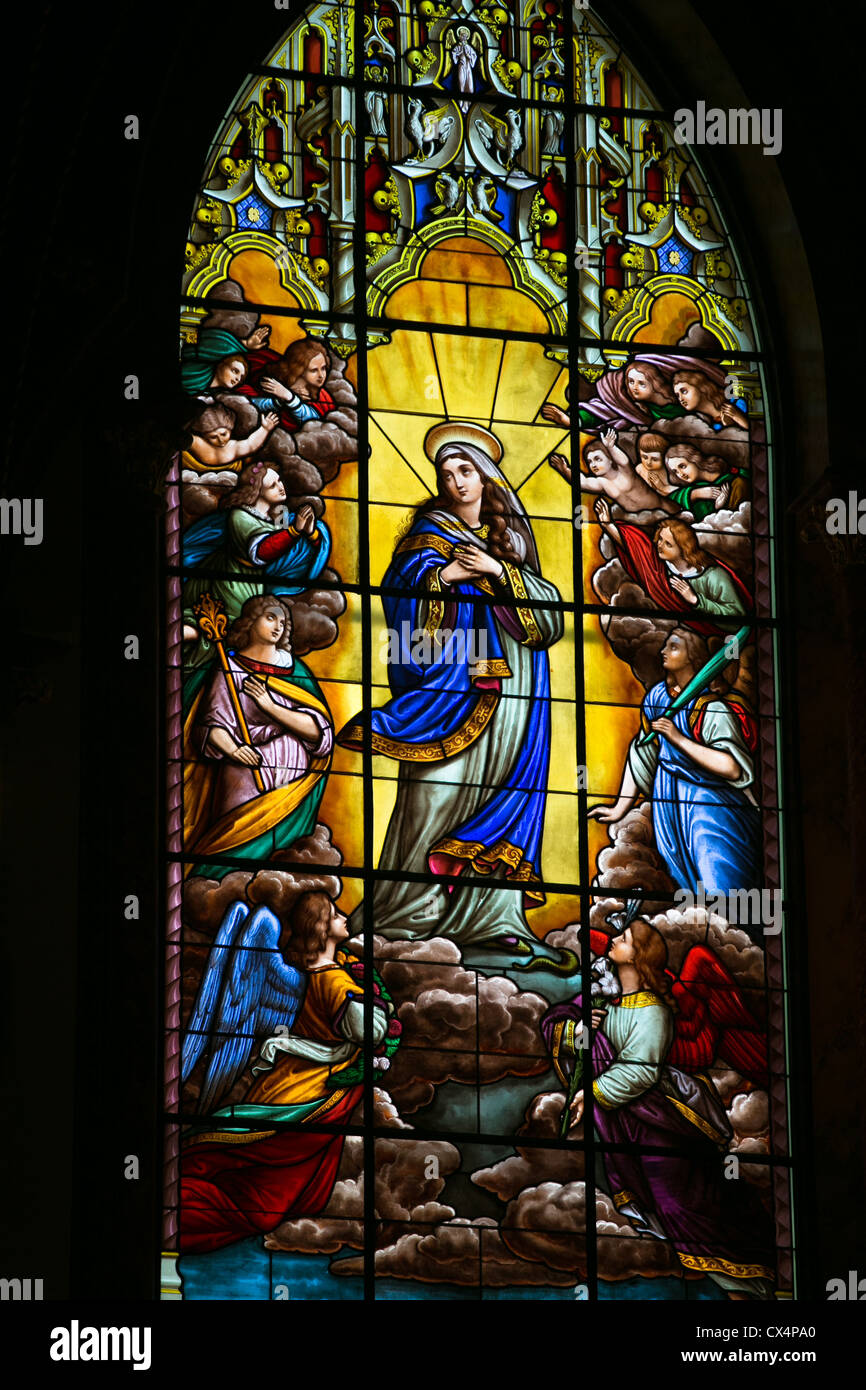 Stained glass window depicting the mother Mary at a church in Austin