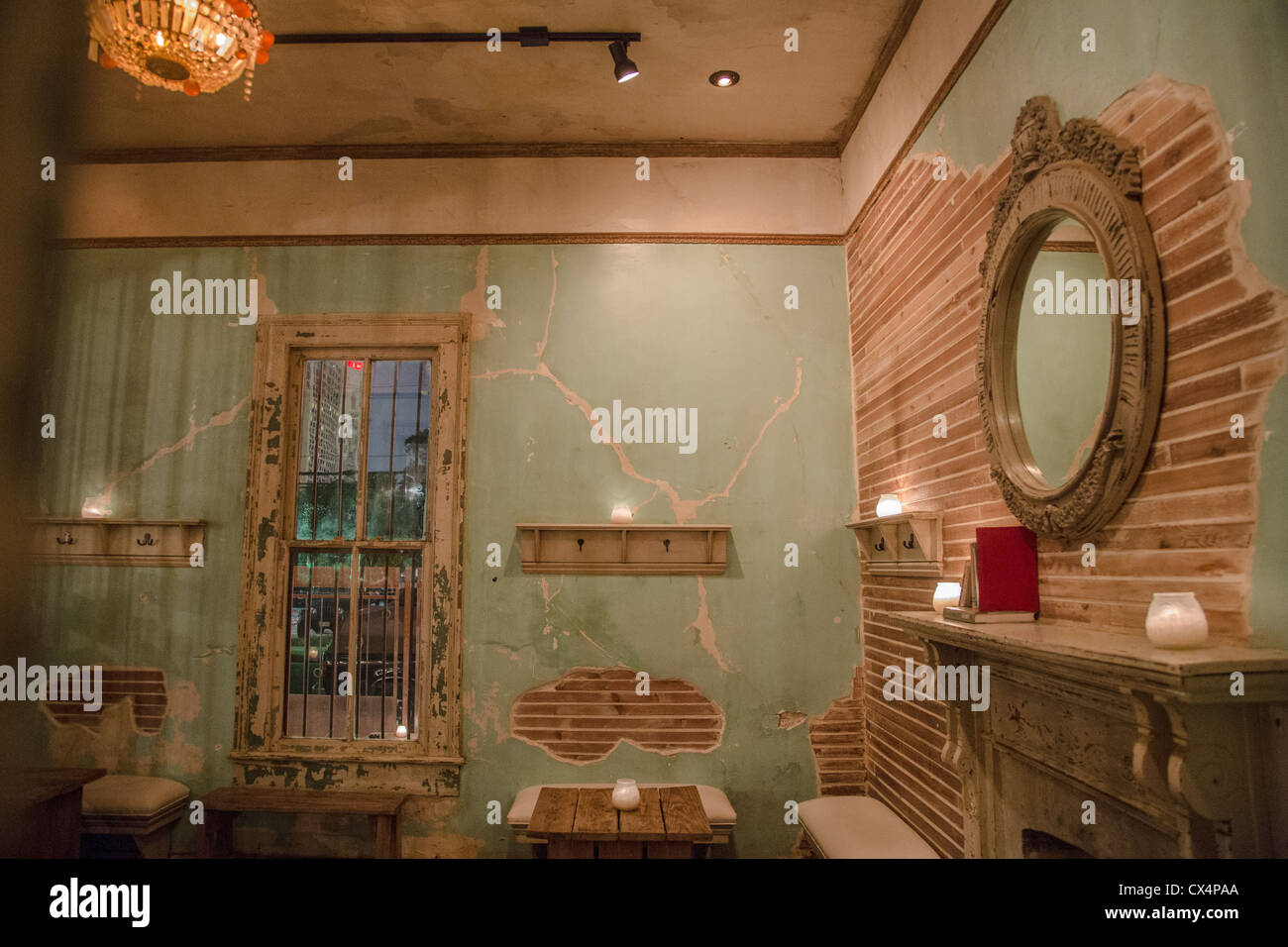 Interior of a the Lustre Pearl bar in Austin, Texas.  The interior was made to look distressed and antique. Stock Photo