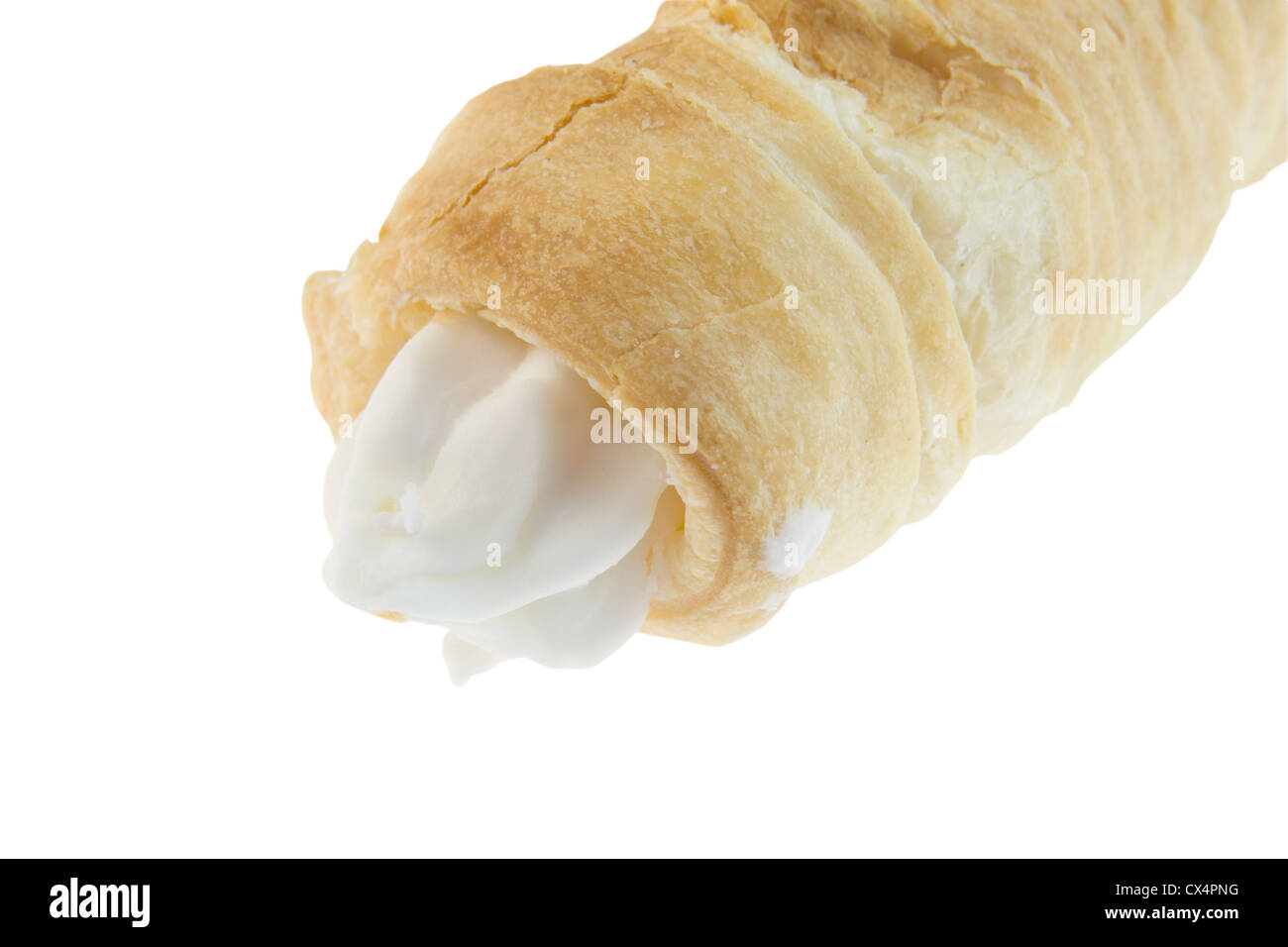 closeup of a flaky, baked pastry with white cream filling isolated on white Stock Photo