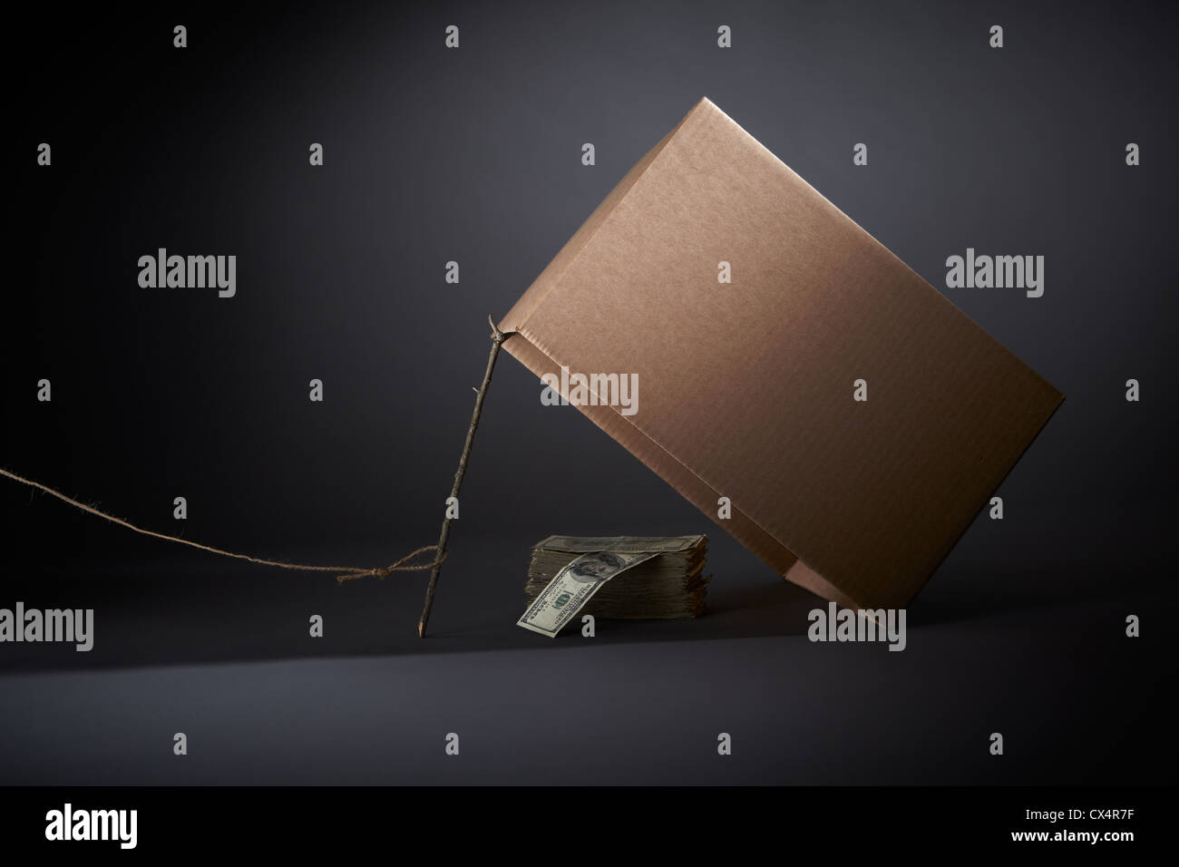 American currency inside a box trap Stock Photo