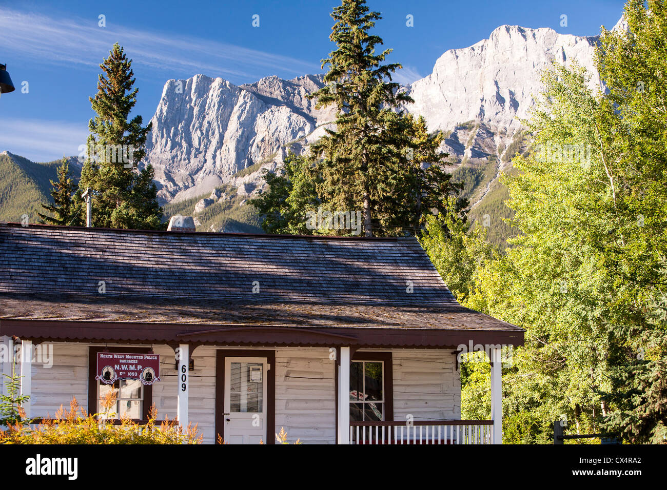 The old preserved barracks of the north West mounted Police in Canmore in the Canadian Rockies in Banff National Park. Stock Photo