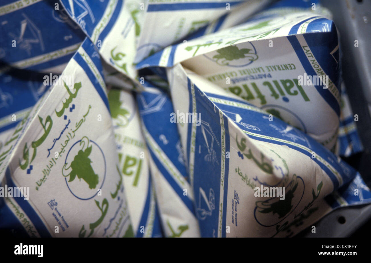 Cartons of milk in a market in Morocco Stock Photo - Alamy