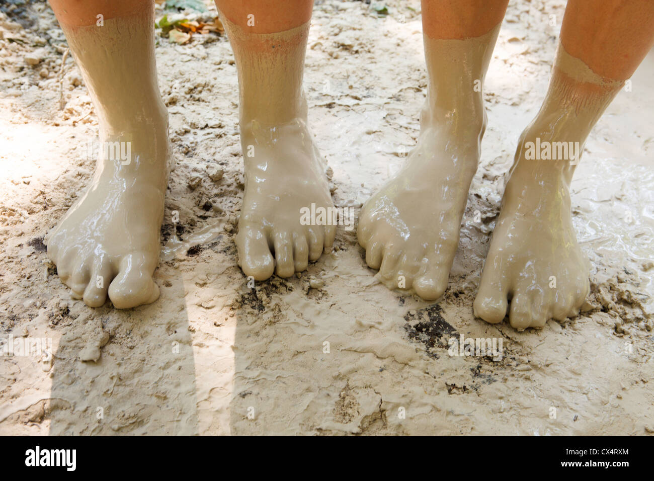 Feet in mud closeup Stock Photo Alamy