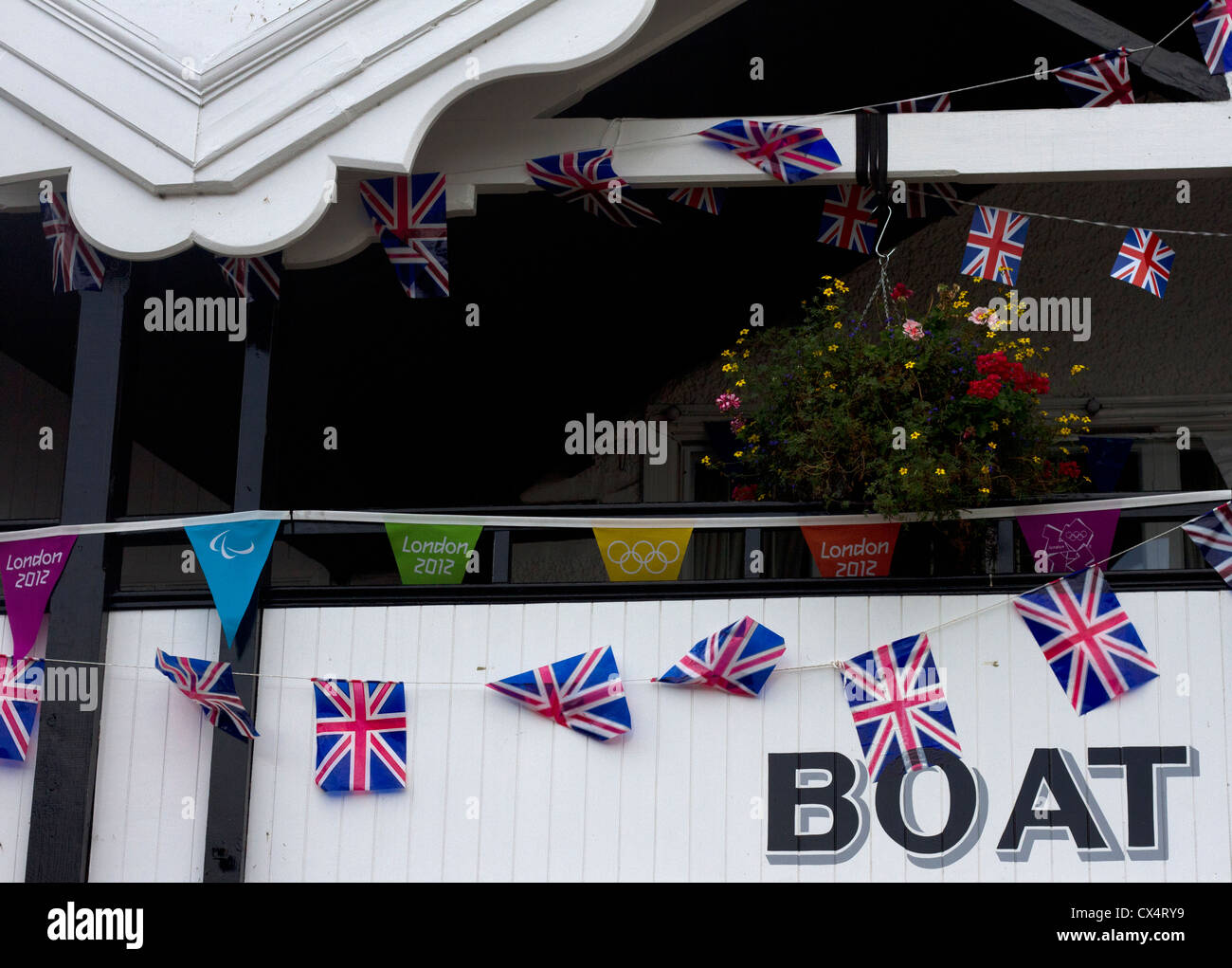 The Molesey Boat Club boathouse with London 2012 Olympics Bunting. Stock Photo