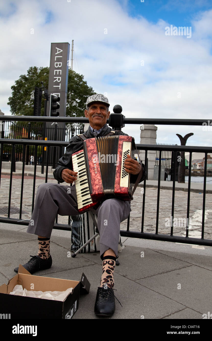 Busker playing piano accordion hires stock photography and images Alamy