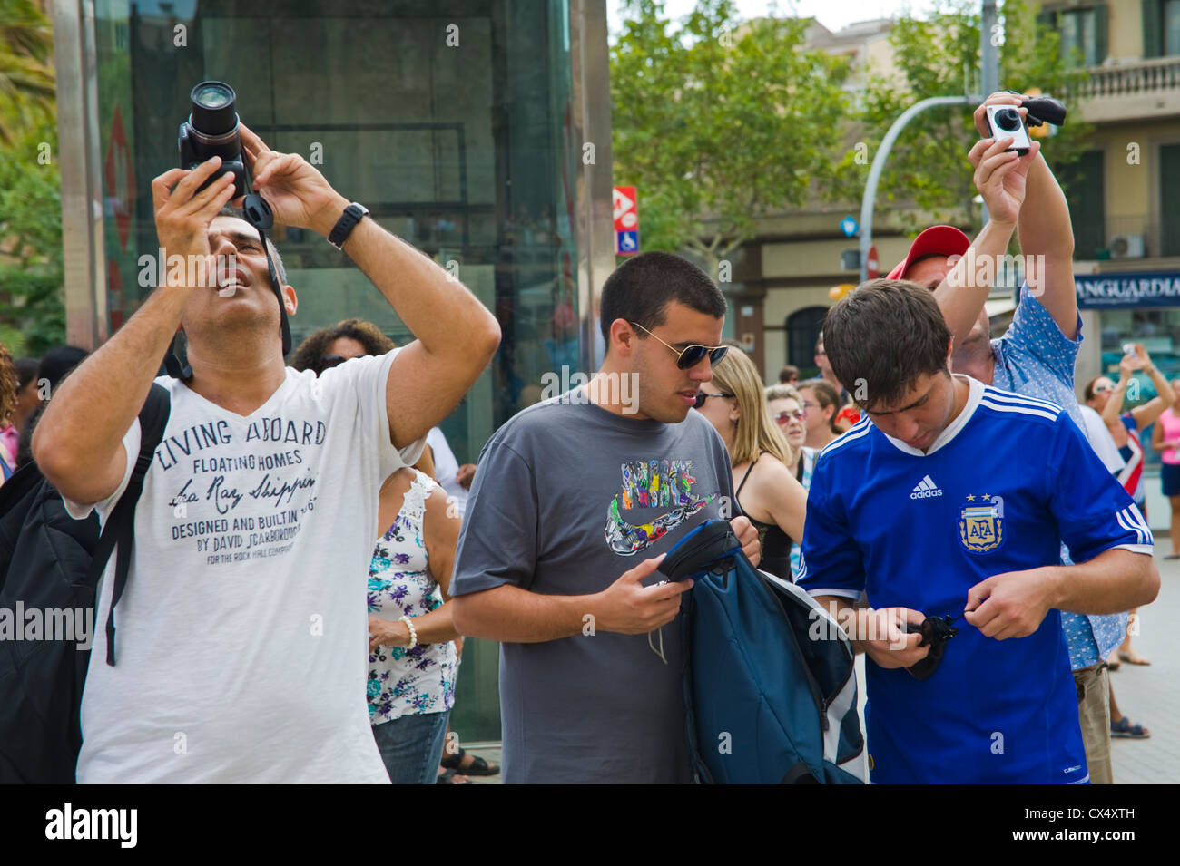 barcelona people street Tourists with digital cameras photographing