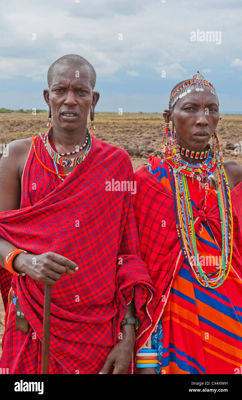 Kenya Africa Amboseli Masai man and woman in red costume dress and ...