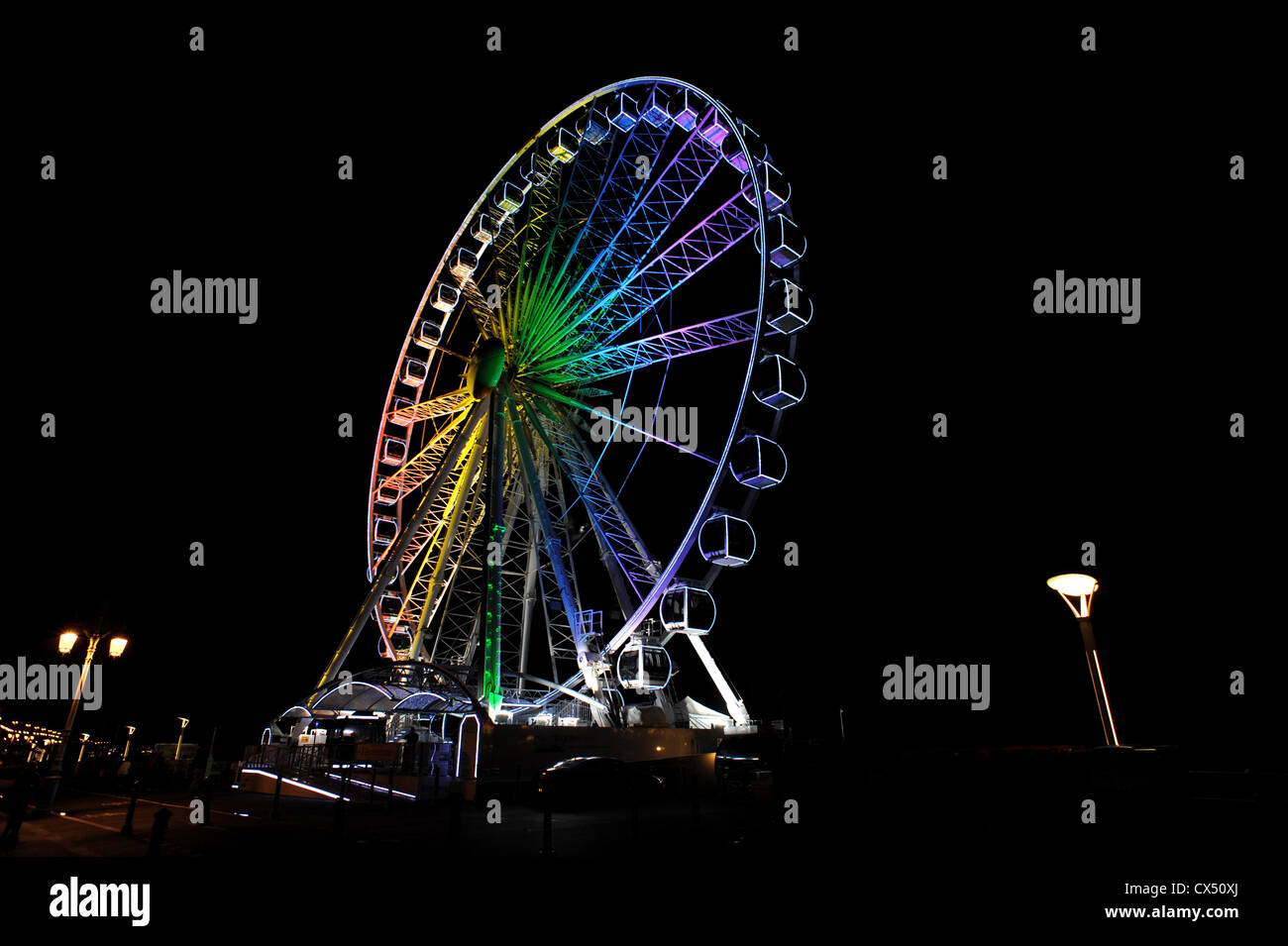 The Brighton Wheel lit up in rainbow colours to celebrate Brighton Gay Pride in the city Stock Photo