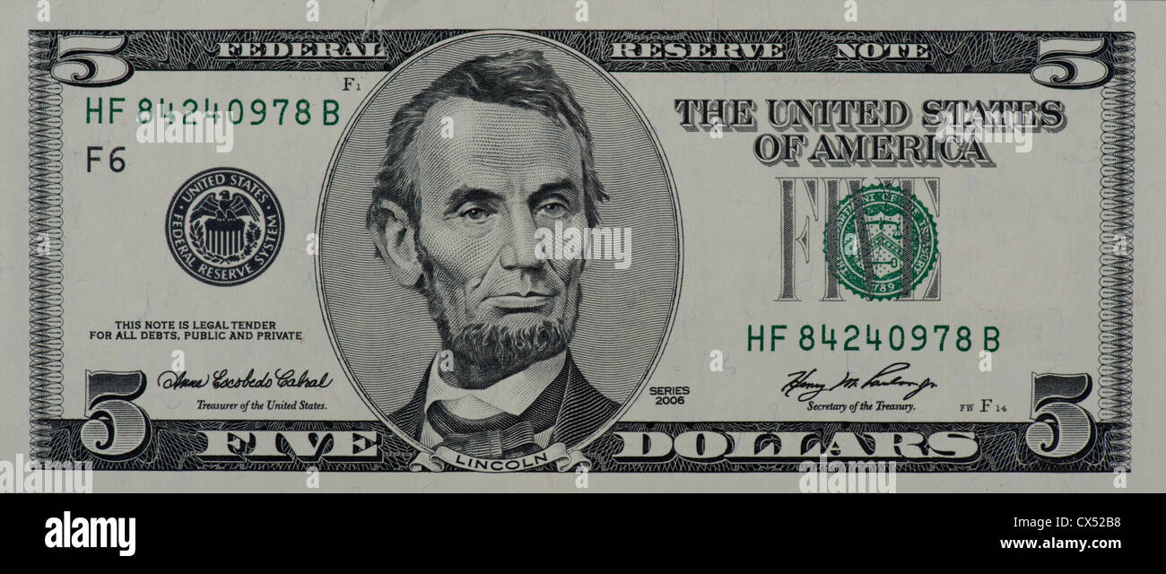 money $5 dollar bill cash currency Stock Photo