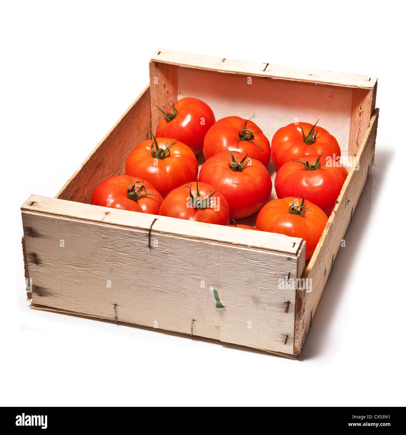 Box of beef tomato's isolated on a white studio background Stock Photo ...