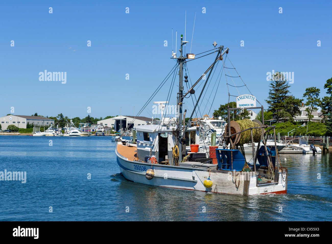 Fishing boat leaving the harbor at Hyannis, Barnstable, Cape Cod