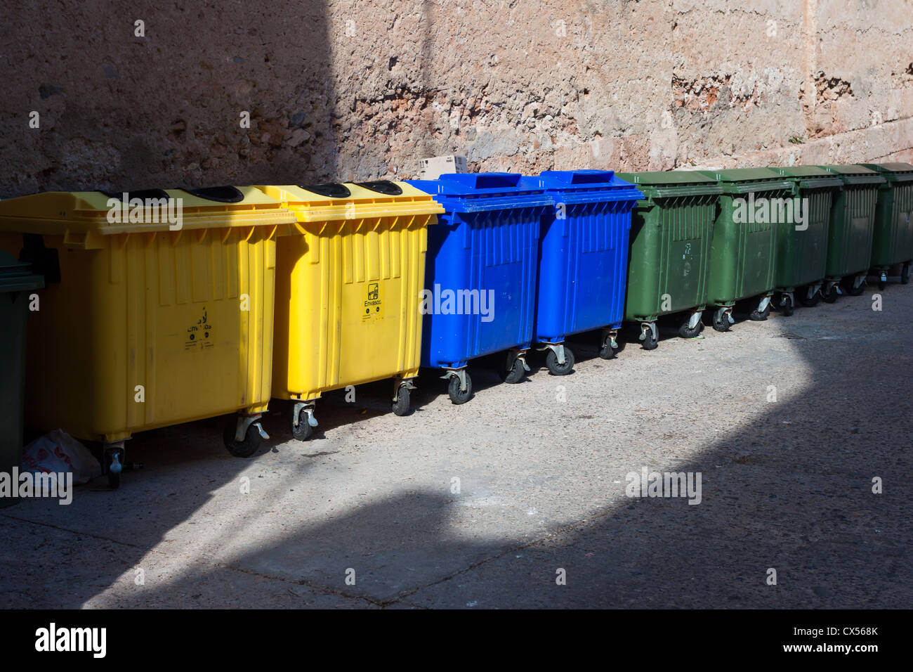 three type of plastic big trash recycling bins on the street Stock
