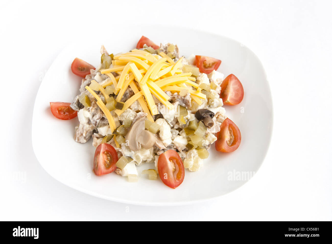 Mixed salad with mushrooms, cheese and tomatos Stock Photo