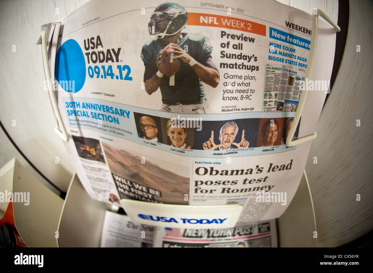 The weekend edition of Gannett's USA Today newspaper is seen on a newsstand in New York on its 30th anniversary Stock Photo