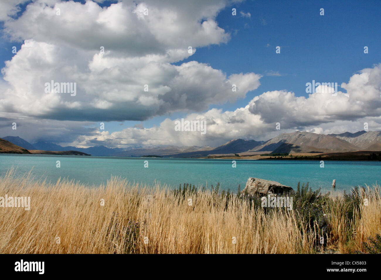 Clouds over Lake Tekapo in South Island, New Zealand Stock Photo - Alamy