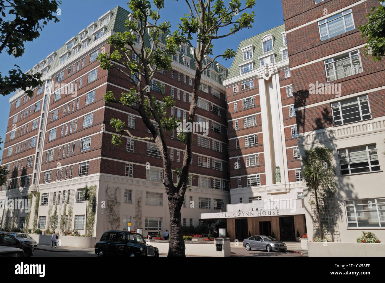 The main entrance and facade to Nell Gwynn House, Sloane Avenue, Royal