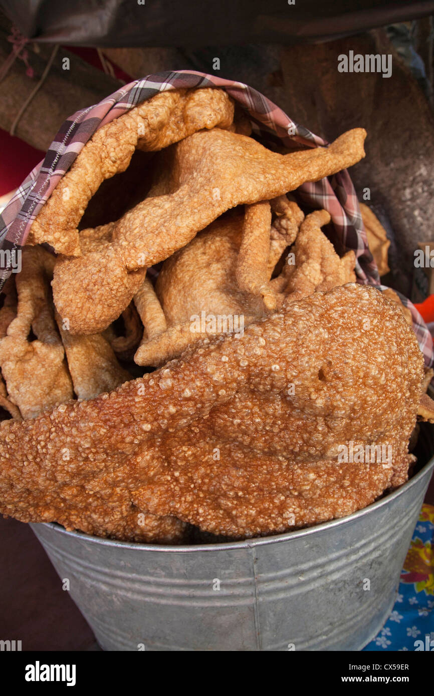 North America, Mexico, Guanajuato State, Guanajuato, bucket of Chicharron (fried pork rind) for