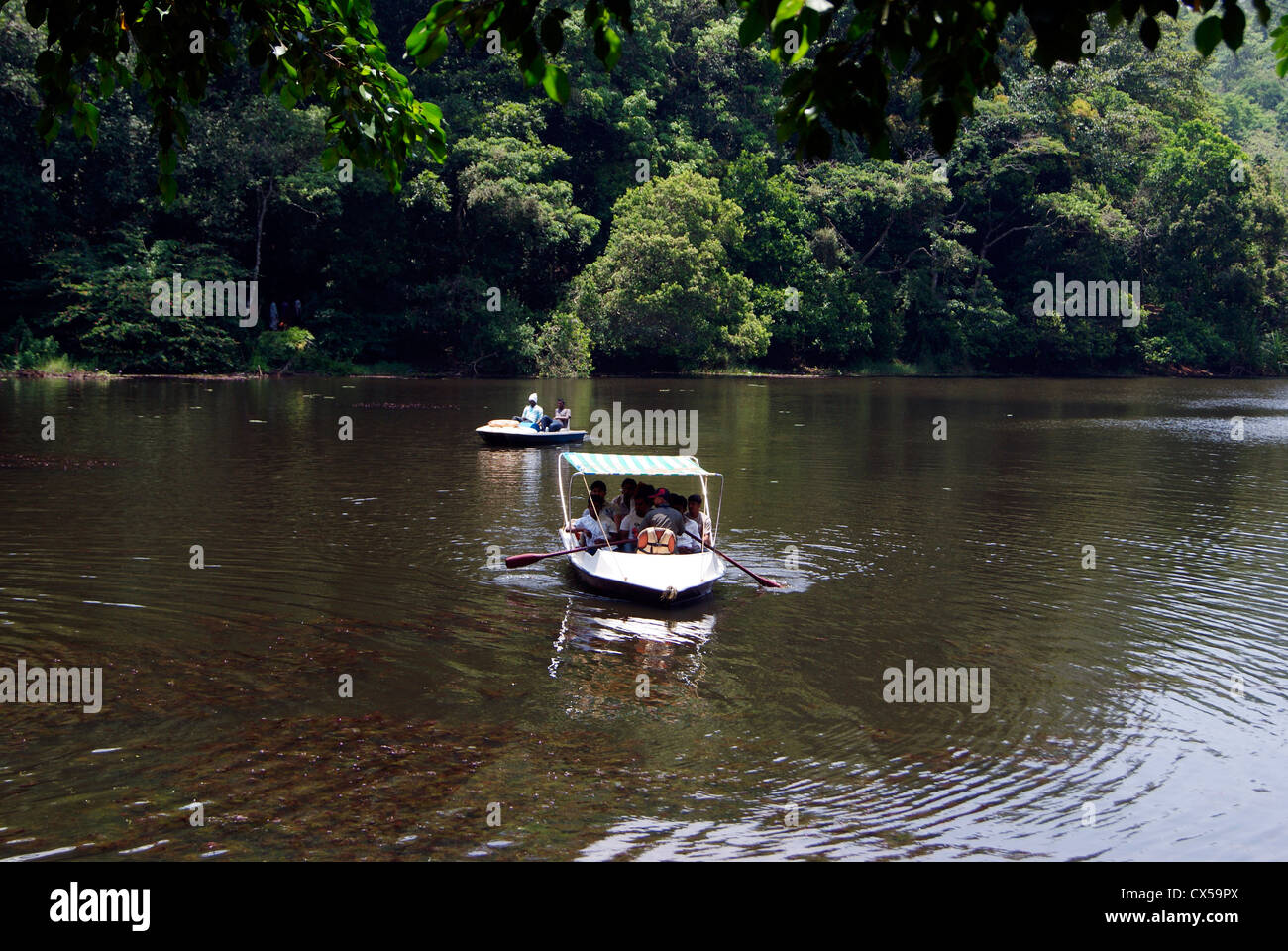 Boating in Freshwater lake of Pookode or pookot lakes scenic Wayanad forest landscapes at Kerala,India Stock Photo