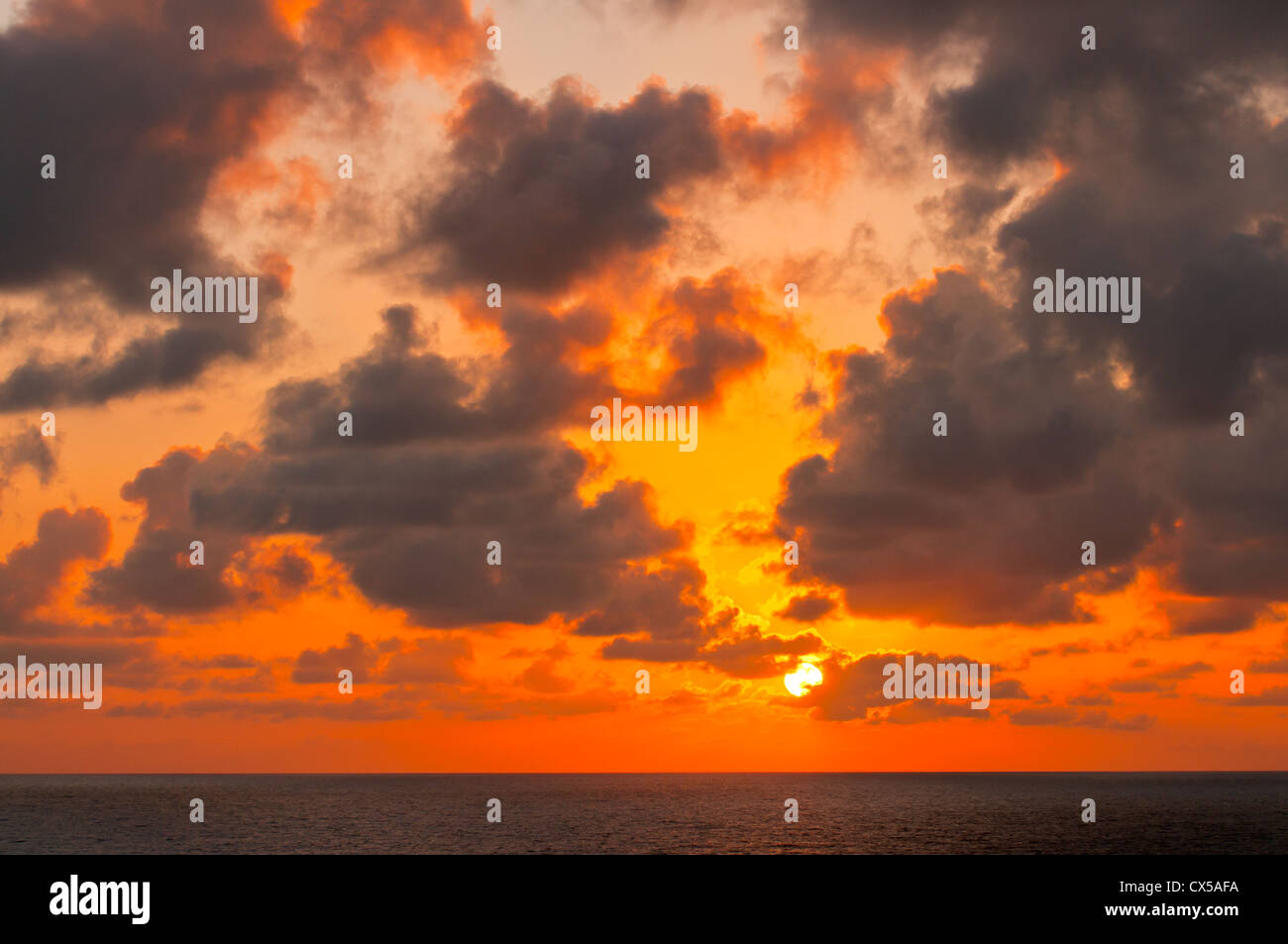 cruise ship Thomson Destiny, sunrise at sea; caribbean; Stock Photo