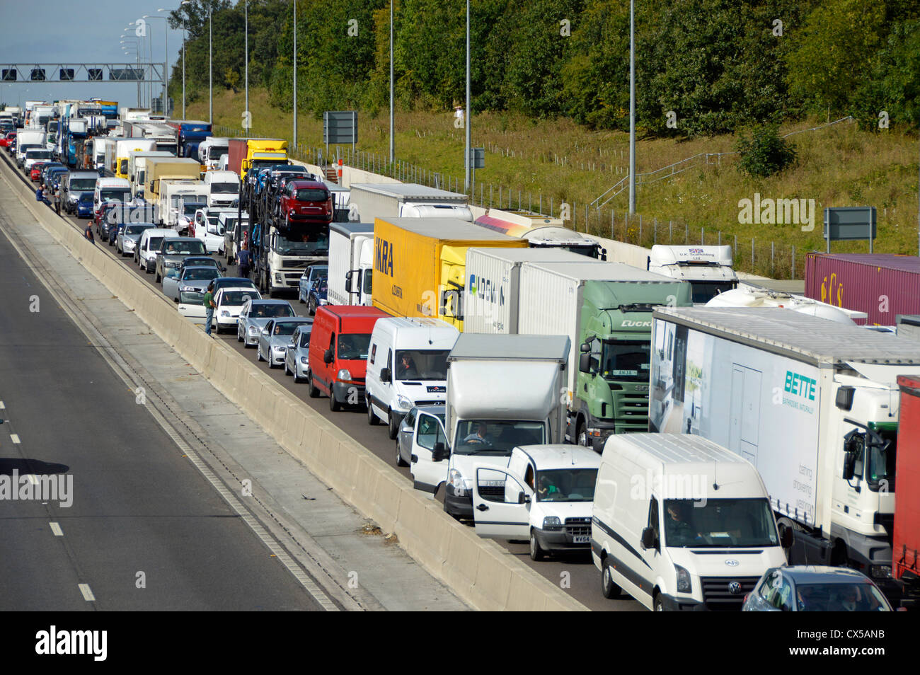 Stationary traffic gridlocked on four lanes of M25 motorway Stock Photo