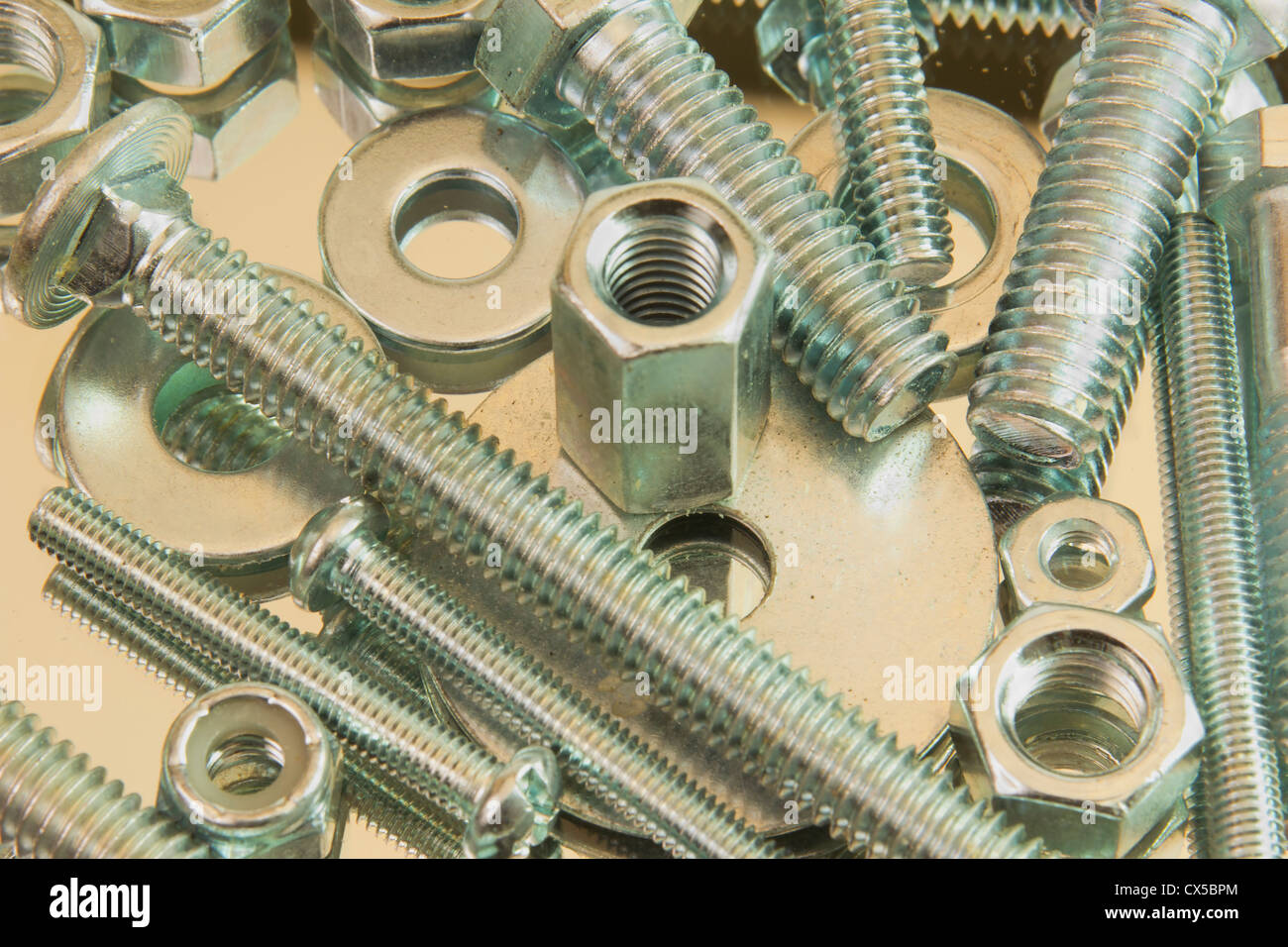 closeup of an assortment of bolts, nuts, and washers Stock Photo
