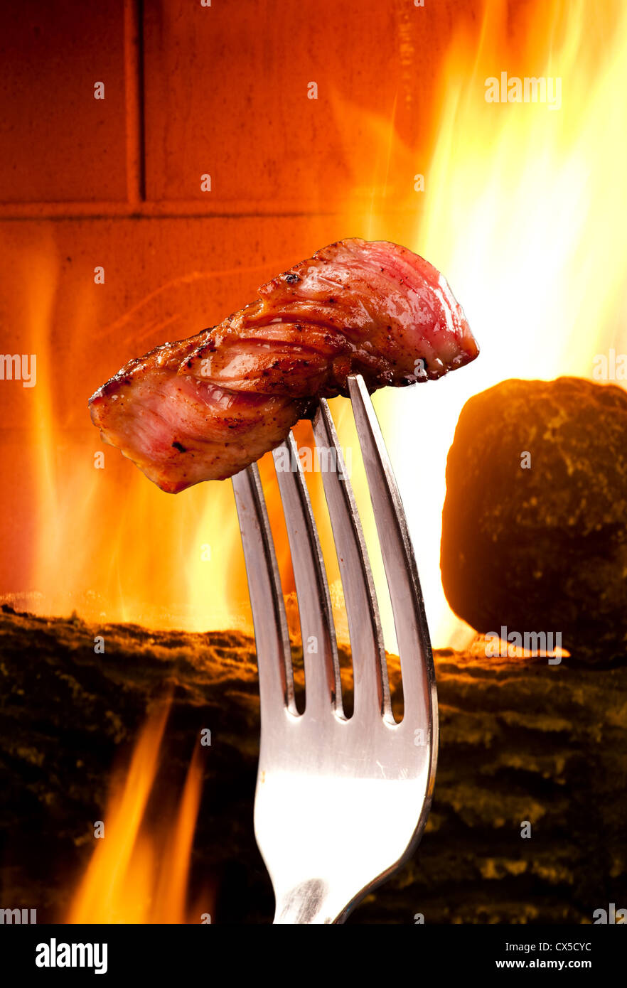 Steak on a Fork. Stock Photo