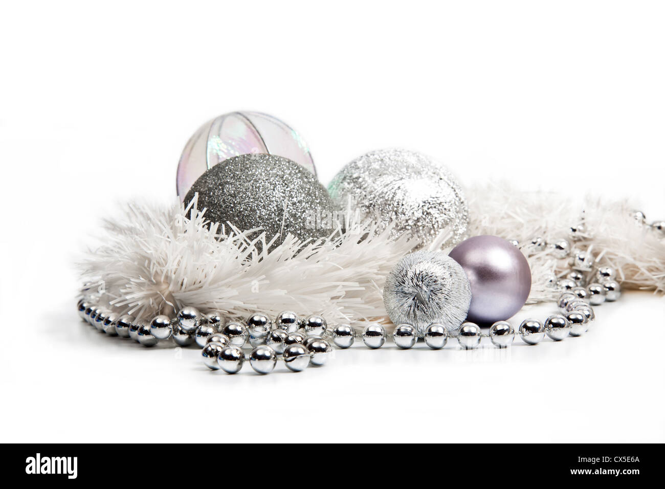 Silver Christmas decorations on white background Stock Photo - Alamy